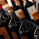 Red wine bottles in a row